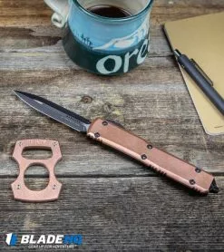 Burnley Knives BRNLY Contra Cypop Bottle Opener Copper/Titanium -Outlet Kitchen Knives Store Microtech Ultratech D E OTF Automatic Knife Copper Top Black BHQ91667 kp desktop web